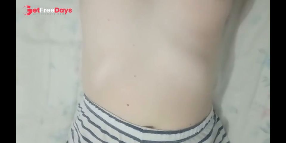Petite girl without clothes sitting on the table